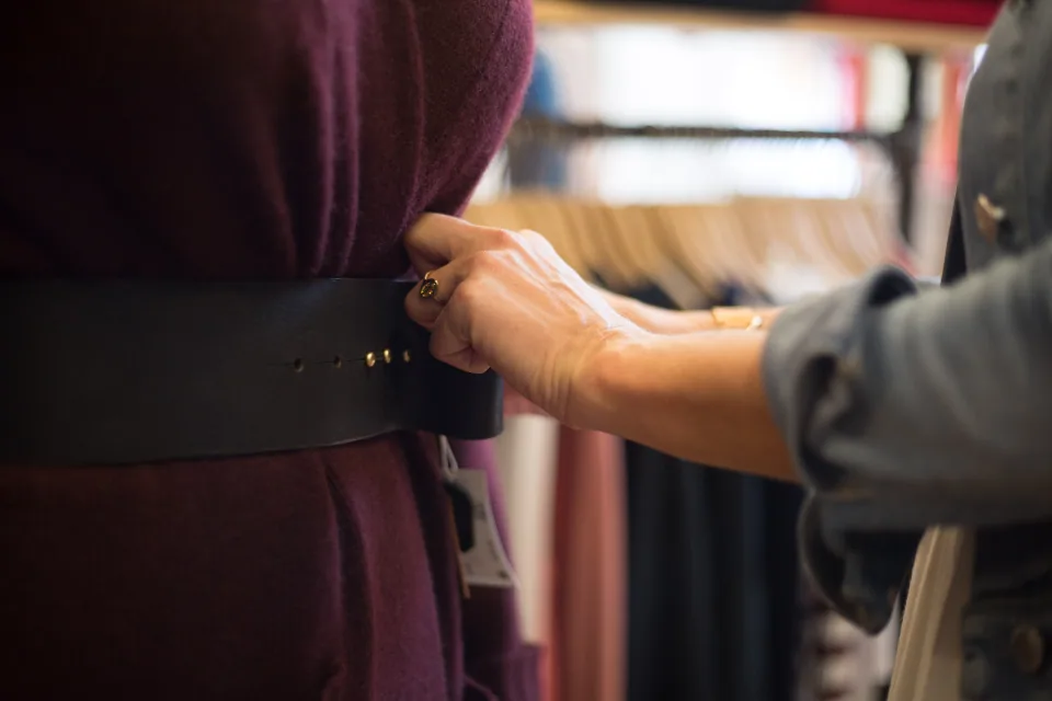 Editorial lifestyle photograph for everyday belts that finish an outfit.